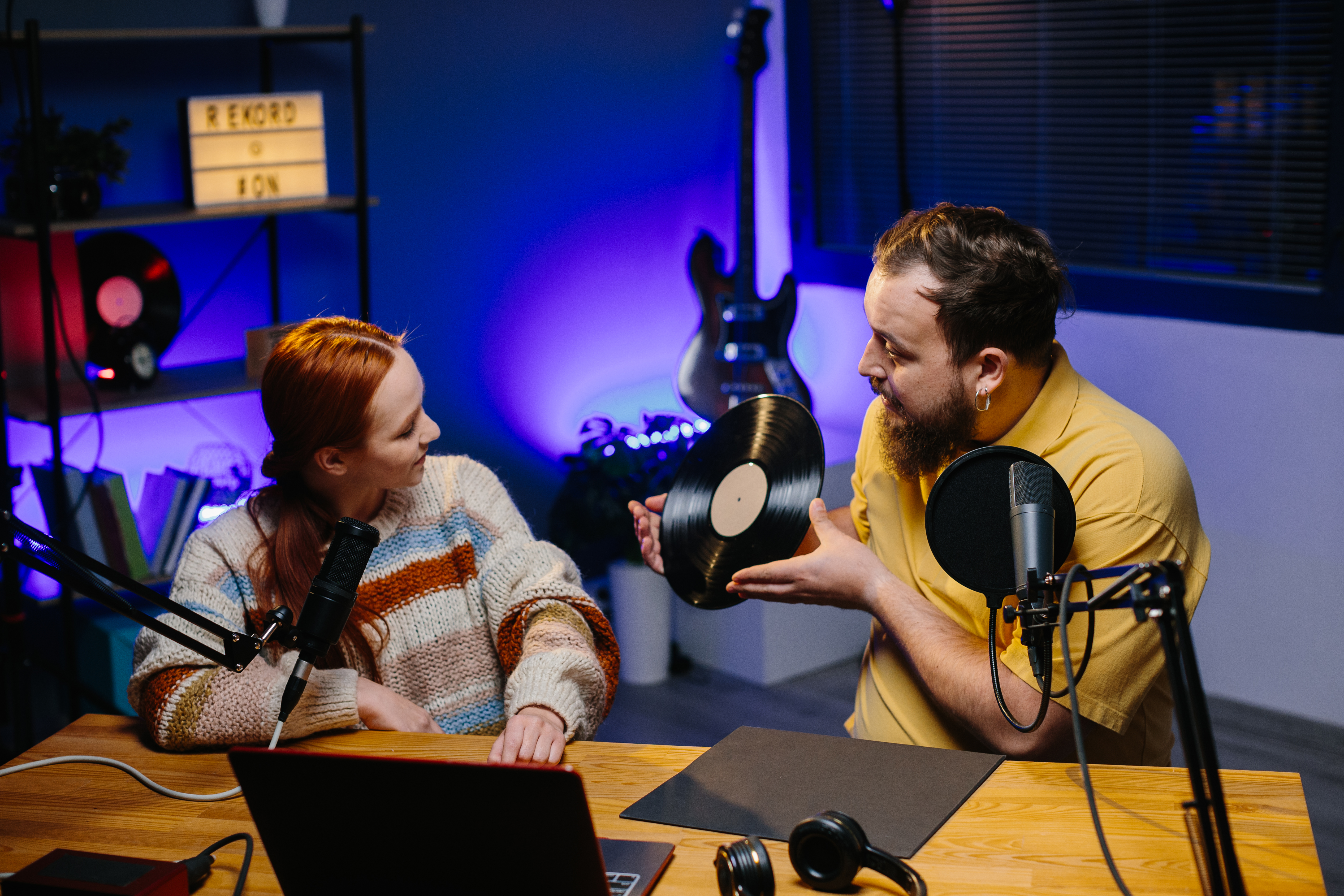 Podcast host recording in professional studio