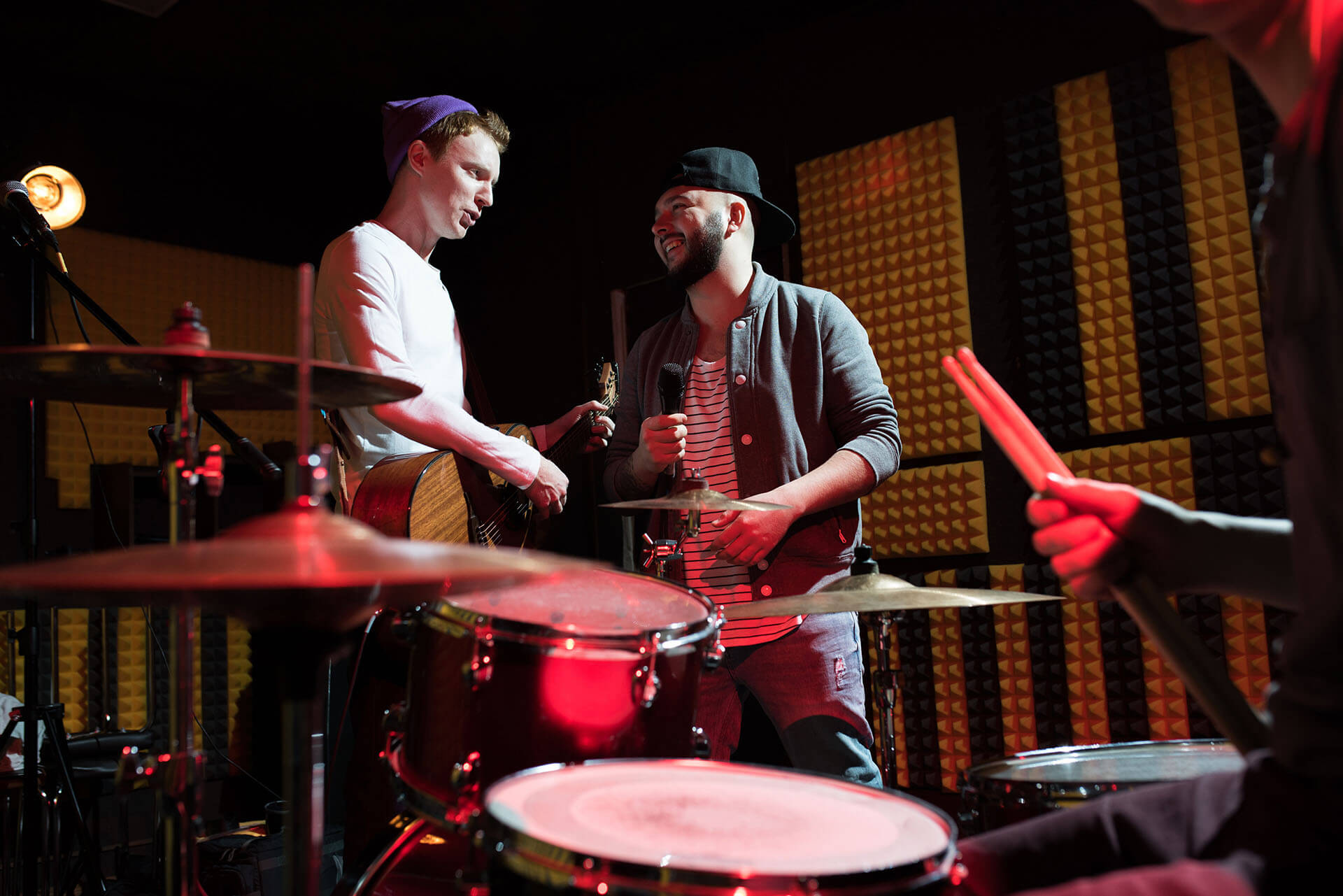 Friends recording session in professional studio