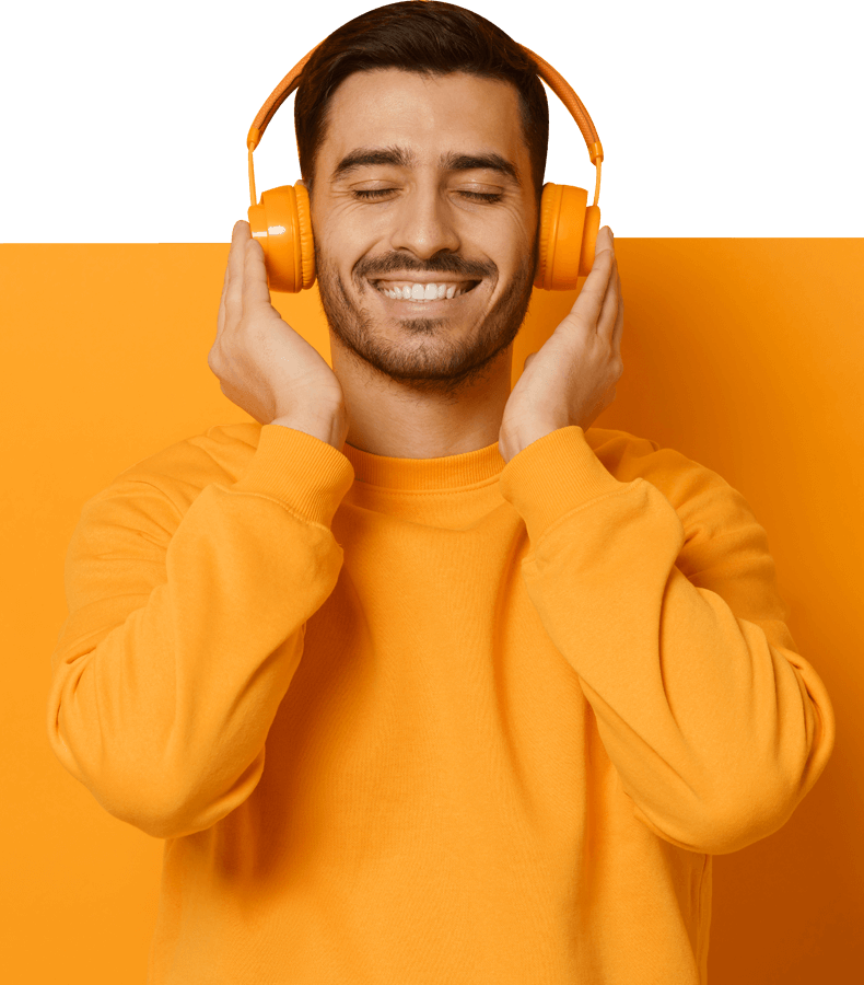 Young man with headphones listening to high-quality audio production